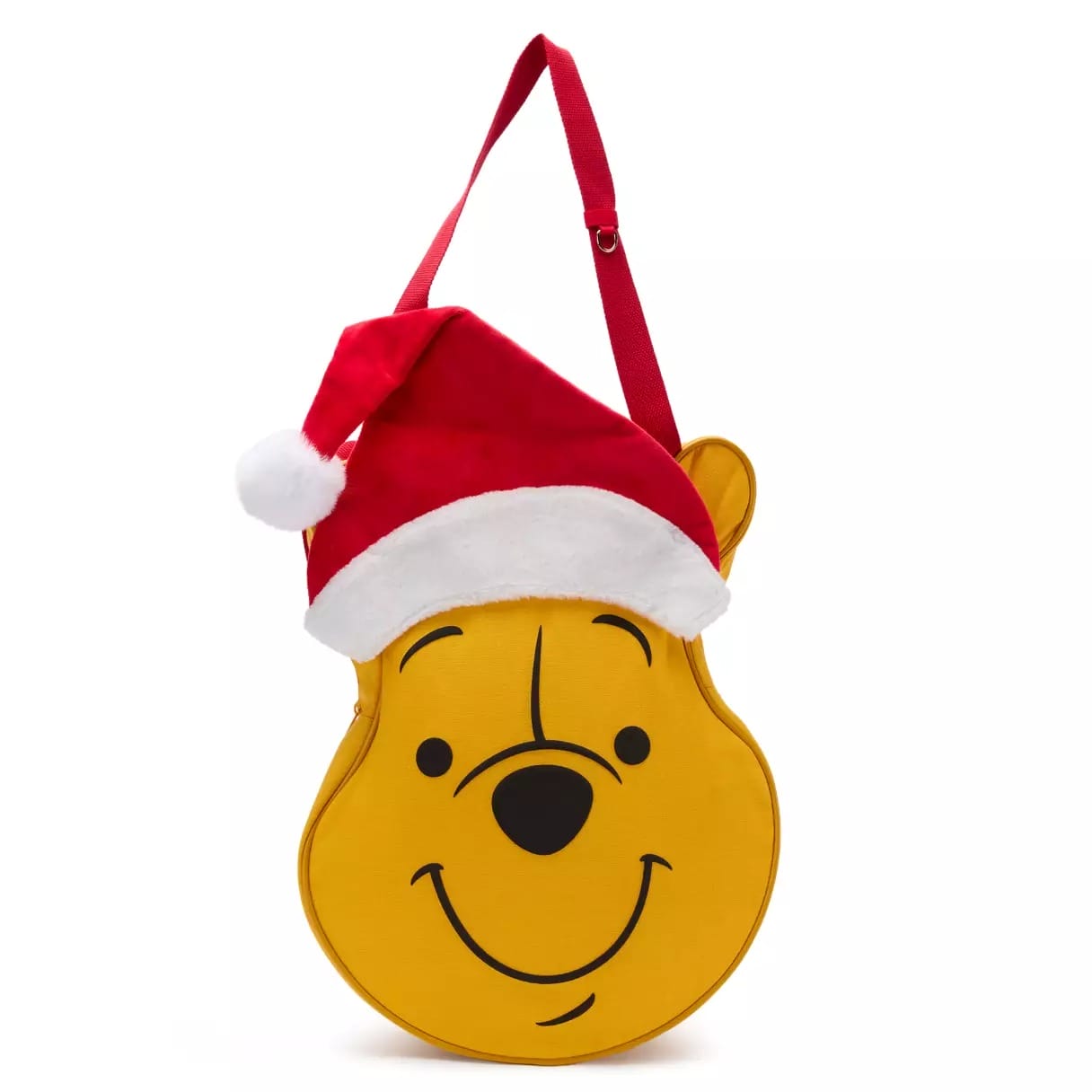 Yellow Winnie the Pooh face bag with red strap and a Santa hat, a festive accessory often seen in Disney Parks during holidays.