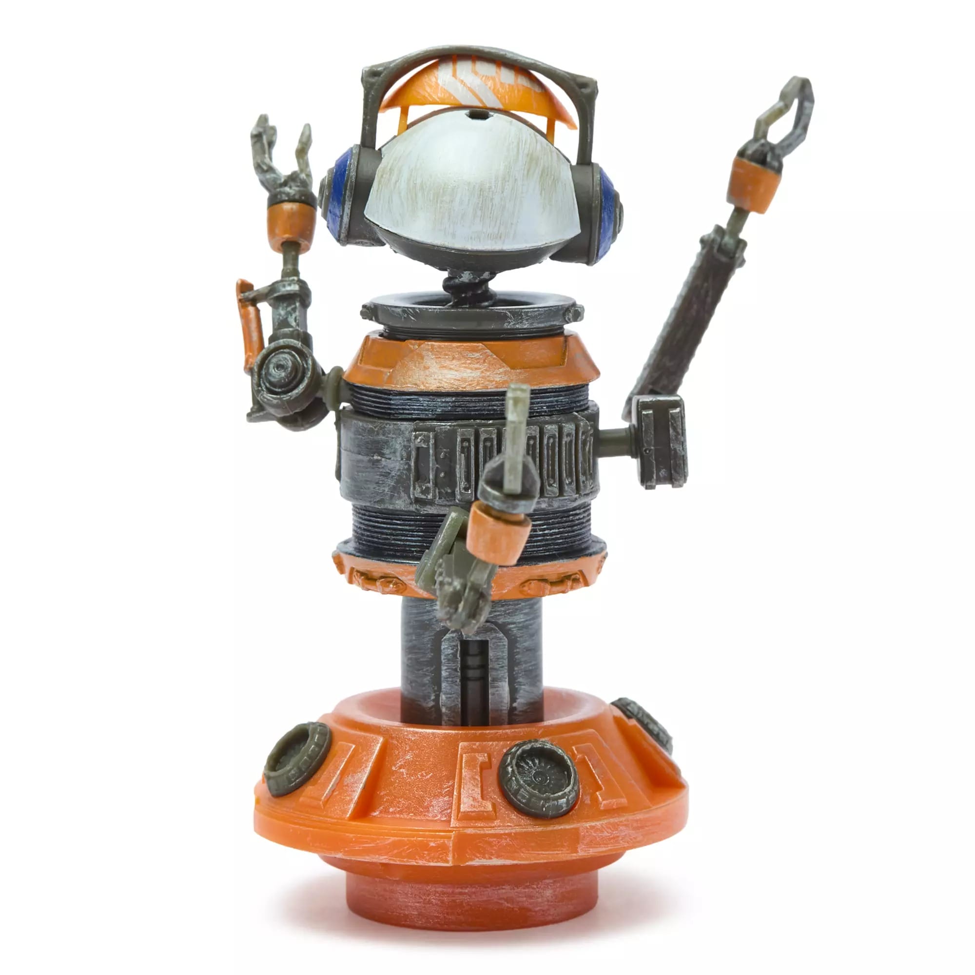 A toy robot with orange and gray parts, sporting headphones and mechanical arms raised, reminiscent of Tomorrowland in Disney parks.