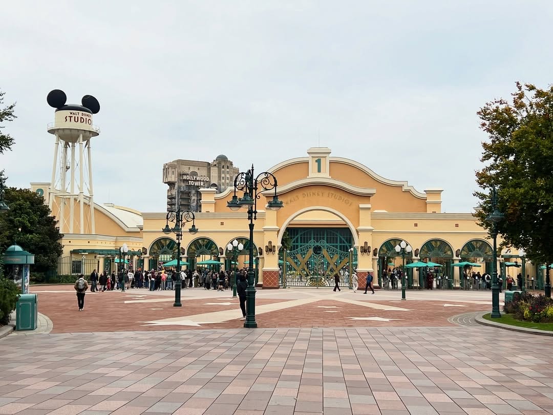 Walt Disney Studios entrance at Disneyland Paris with its signature Mickey Mouse-ear water tower, unlike any Disney castle worldwide.