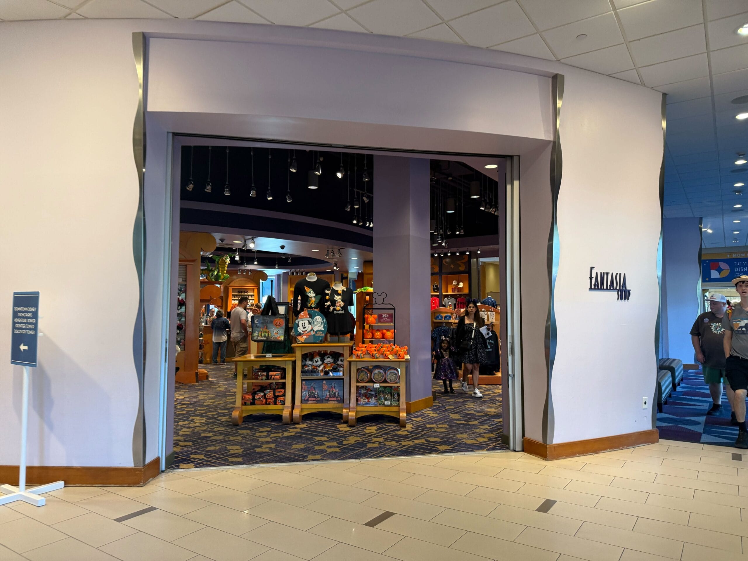 Entrance to the Fantasia gift shop at Disneyland Hotel, featuring a colorful 70th Anniversary merchandise collection.