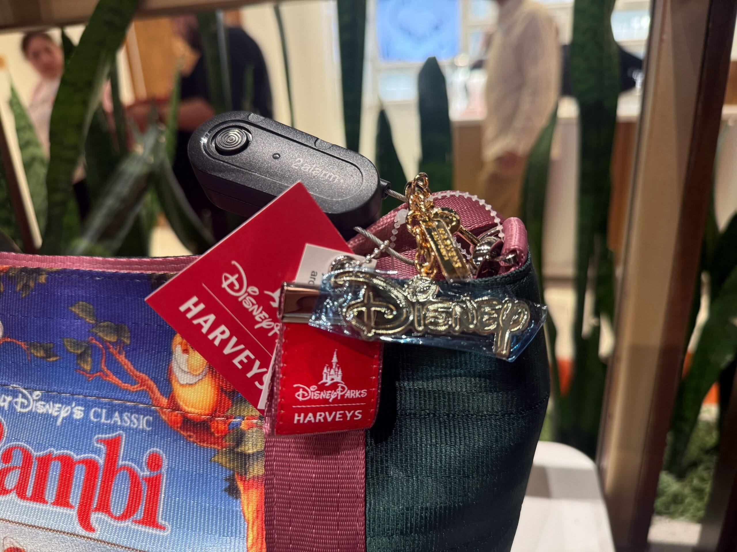 A Disney Bambi handbag with authentic Disney Parks tags, matching keychain, and security tag—no castle like at the parks in sight.