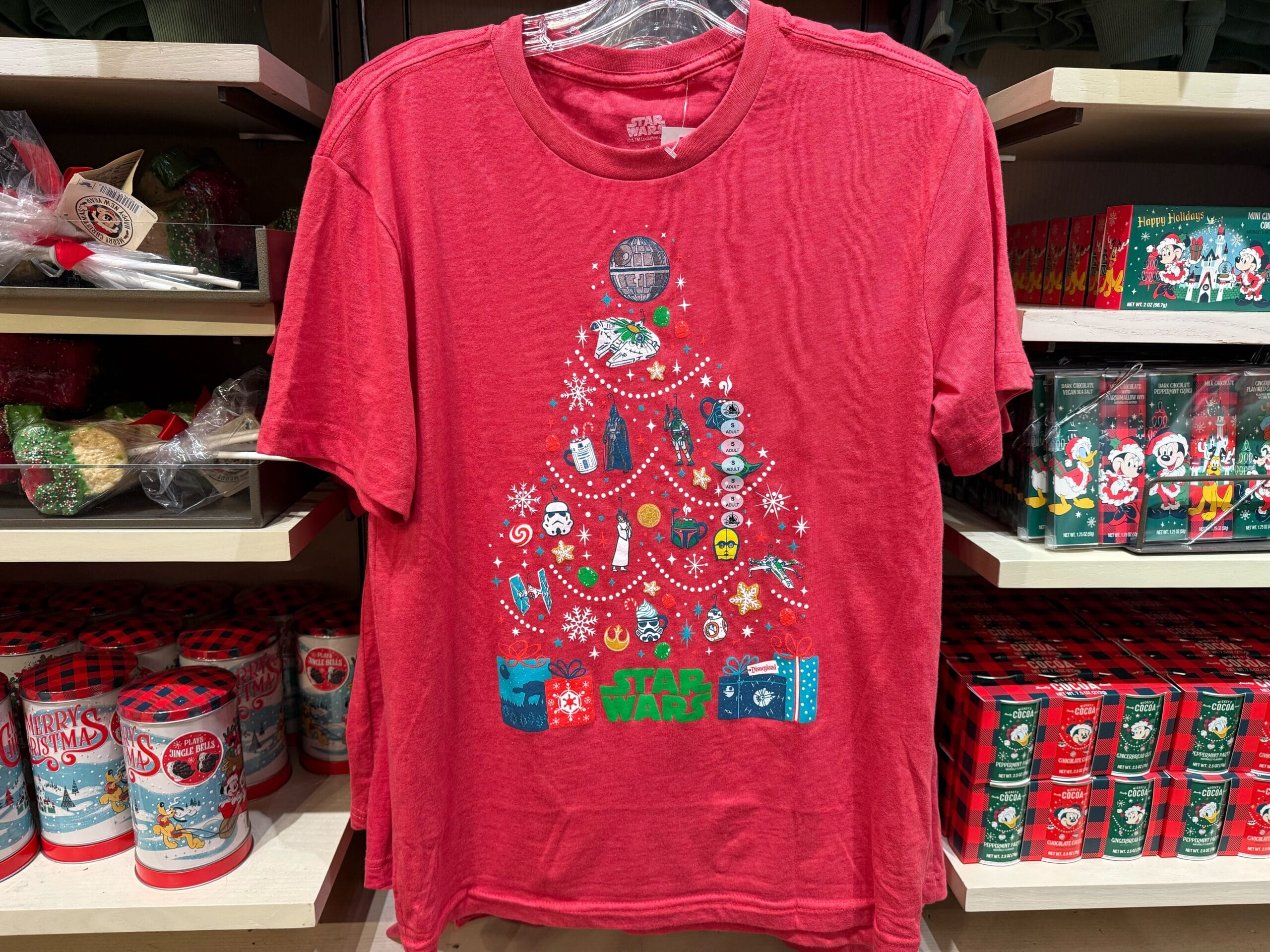 Red tee featuring a Christmas tree made of Star Wars ornaments, new holiday merch at Disneyland Resort—not seen at Disney World.