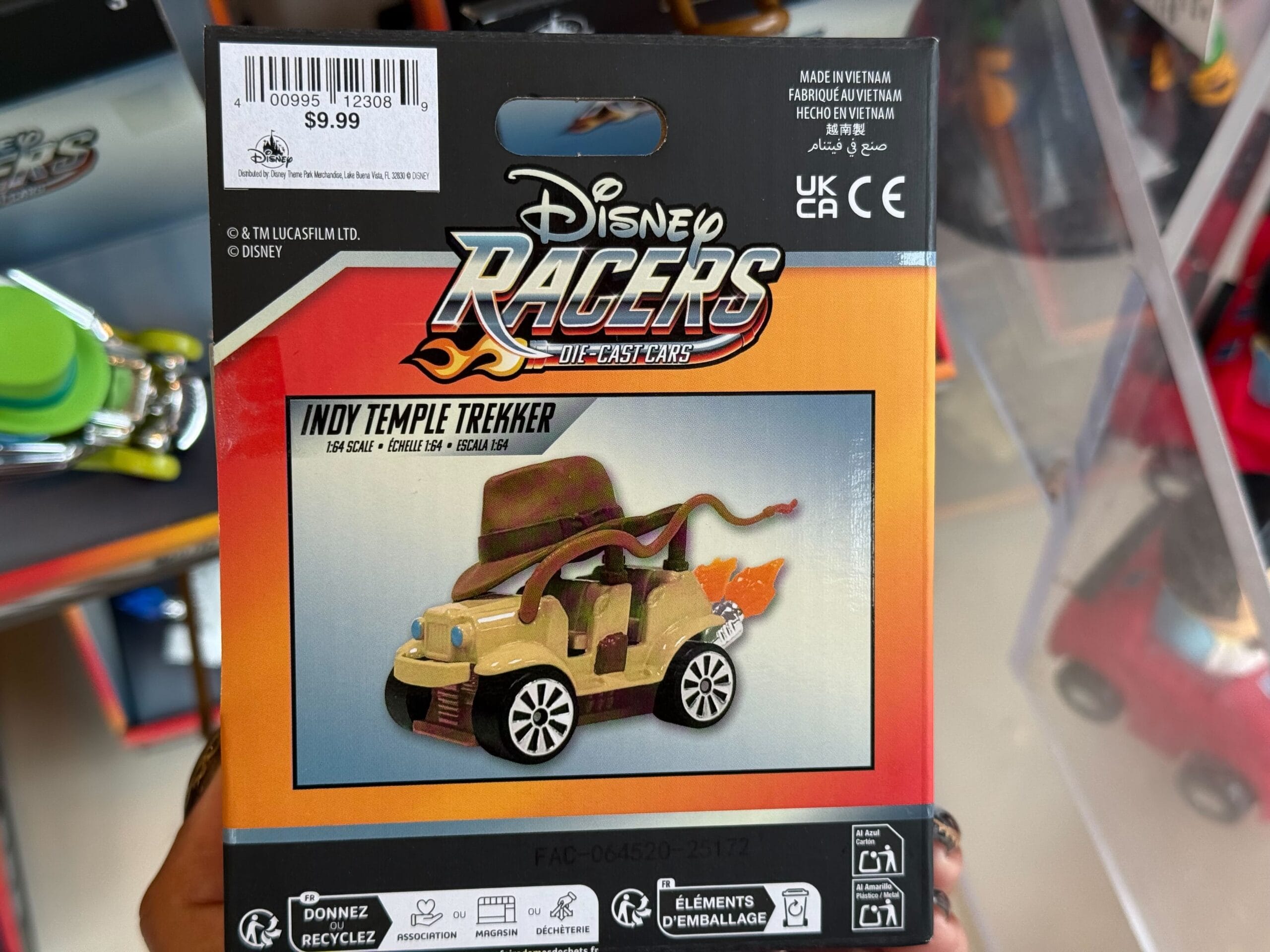 Disney Racers Indy Temple Trekker toy car, boxed with hat and whip art, $9.99 at Disneyland—no castle in view to compare.