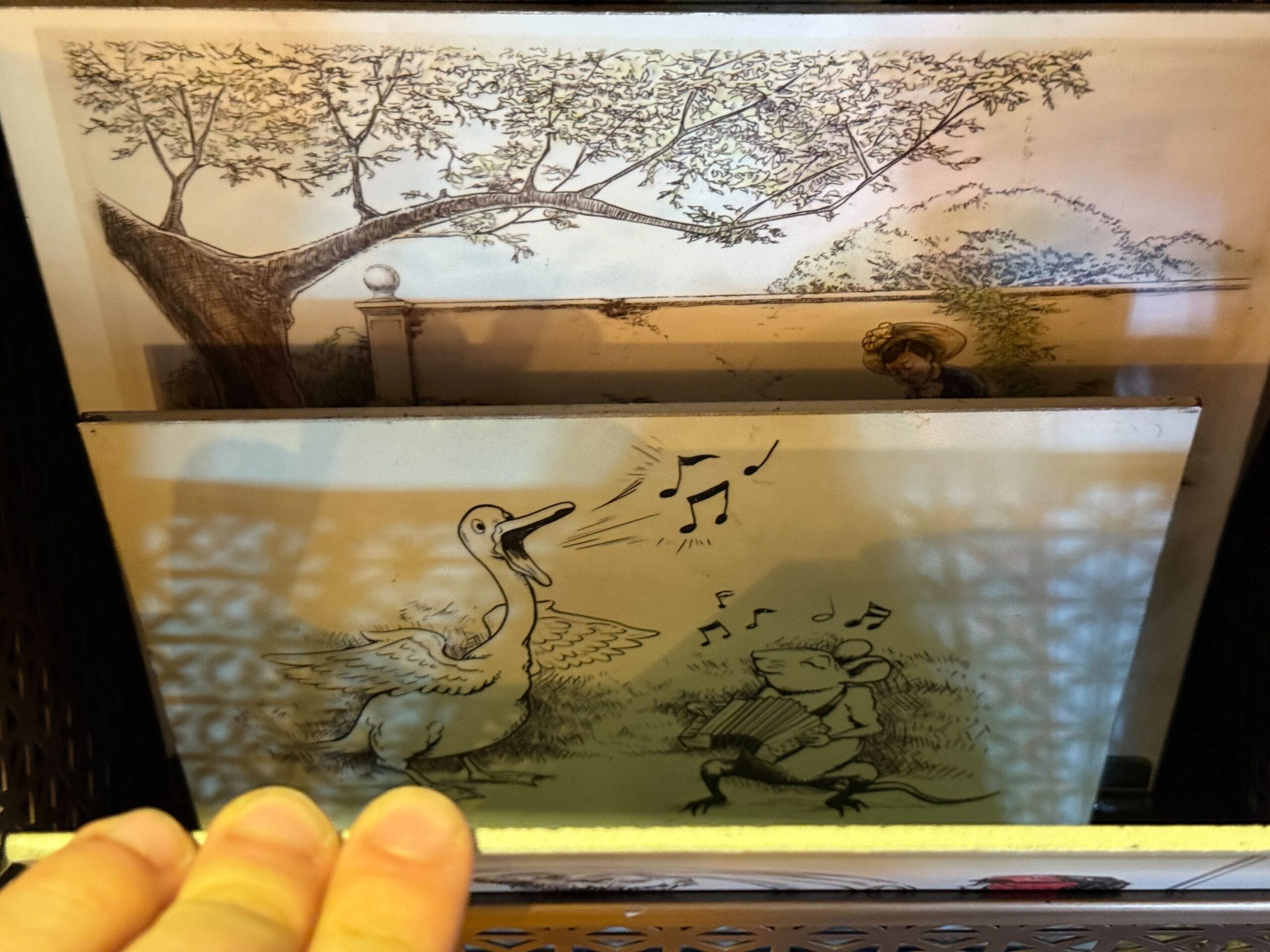 A whimsical scene of a goose singing and a mouse with an accordion beneath a tree, evoking vintage Disney park character art.