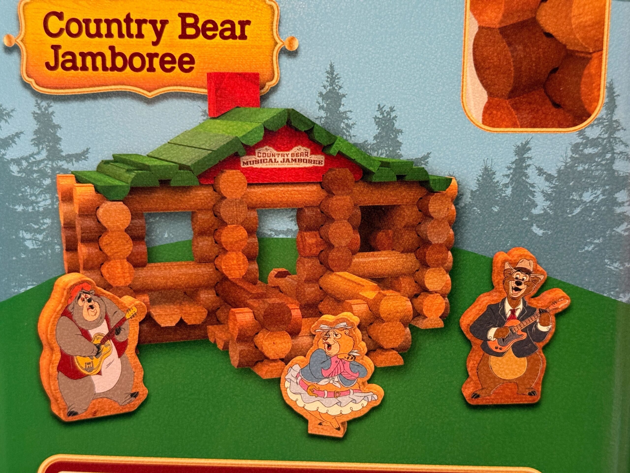 Three cartoon Country Bears play music by a log cabin in Frontierland, under a "Country Bear Jamboree" sign.