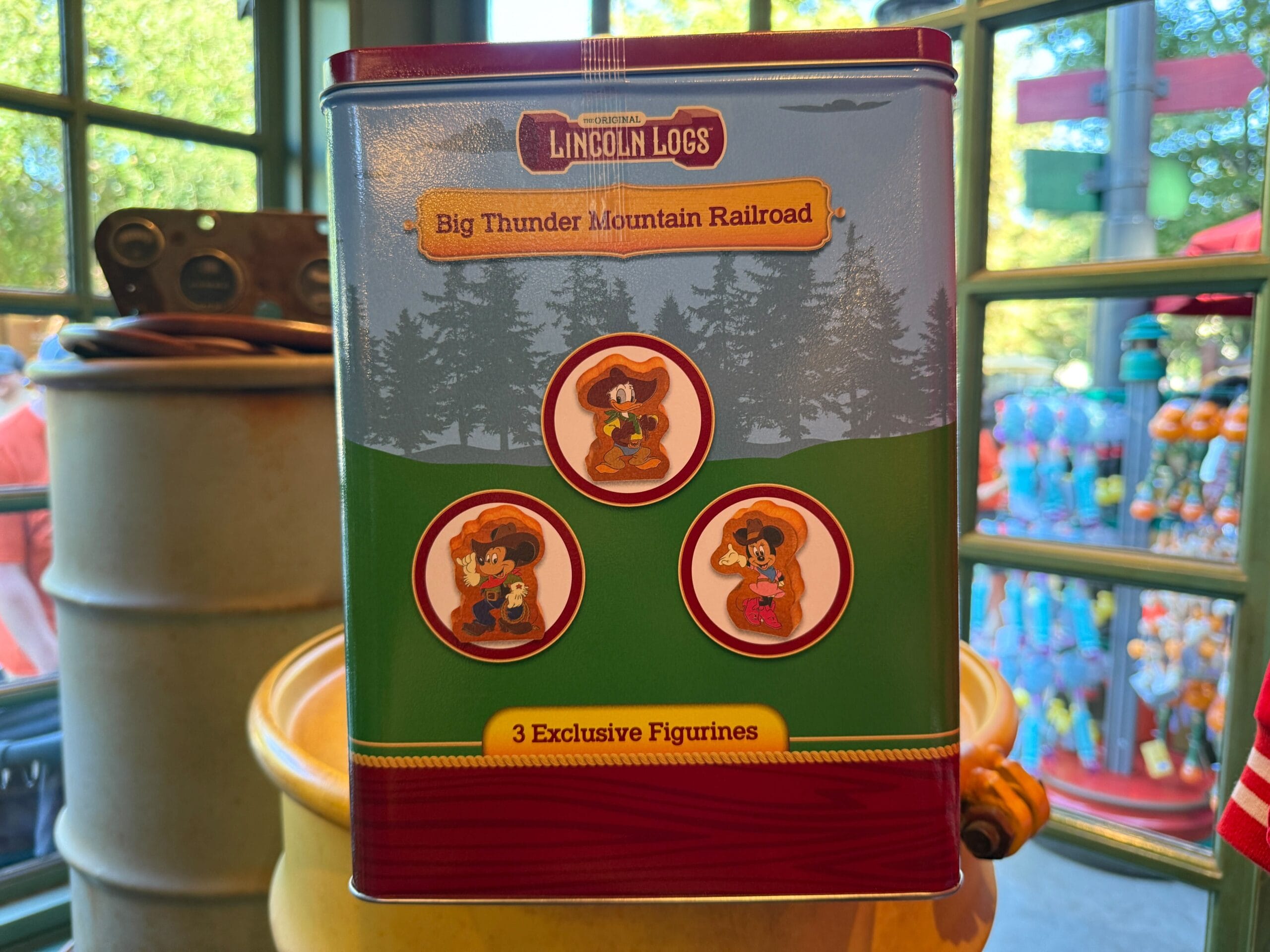 A Frontierland Lincoln Log Set featuring Big Thunder Mountain Railroad and three exclusive character figurines on the front.