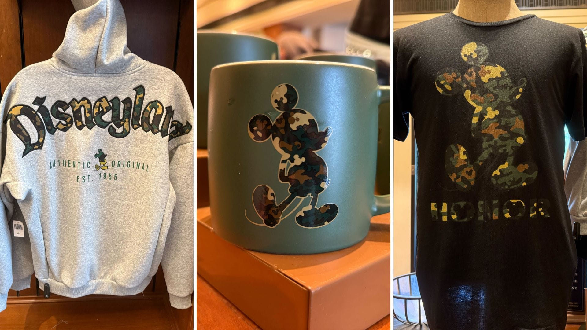 Three items from the Mickey camouflage collection: a gray Disneyland hoodie, green mug, and black "Honor" tee.