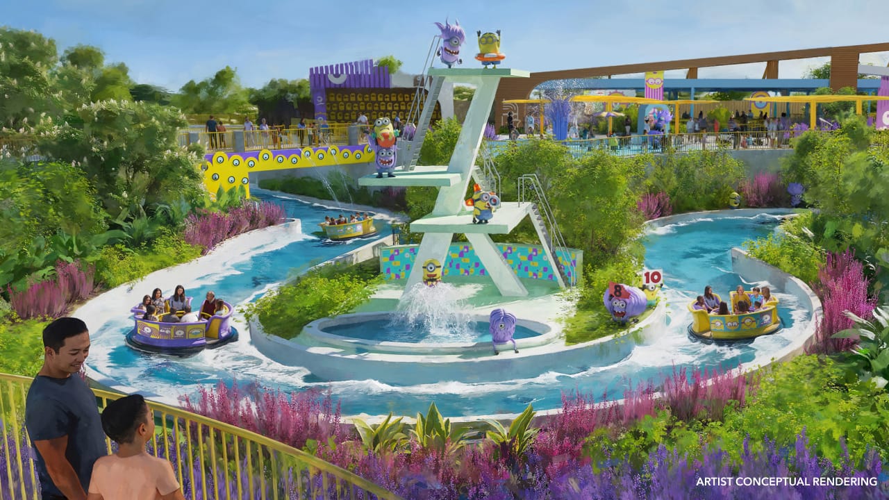 Guests observe as riders float on vibrant Minion rafts in a lushly planted water ride—distinct from any Disneyland castle scenes.