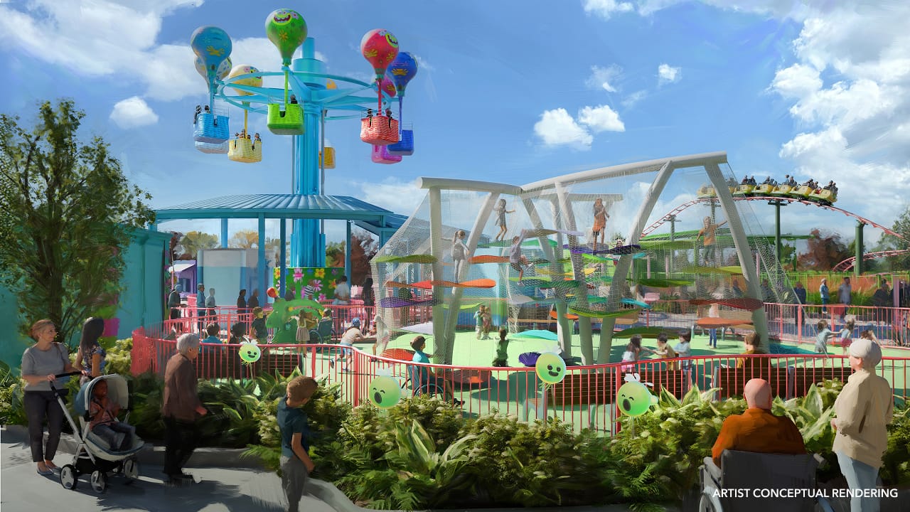 Concept art of Universal Kids Resort with vibrant themed lands, families, rides, and decor, unlike any Disney park castle.