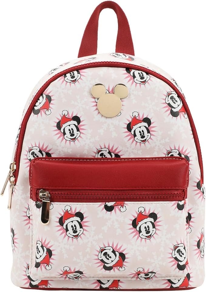 Small backpack with brown pleather straps and trim, Santa Mickey print, and gold Mickey emblem.