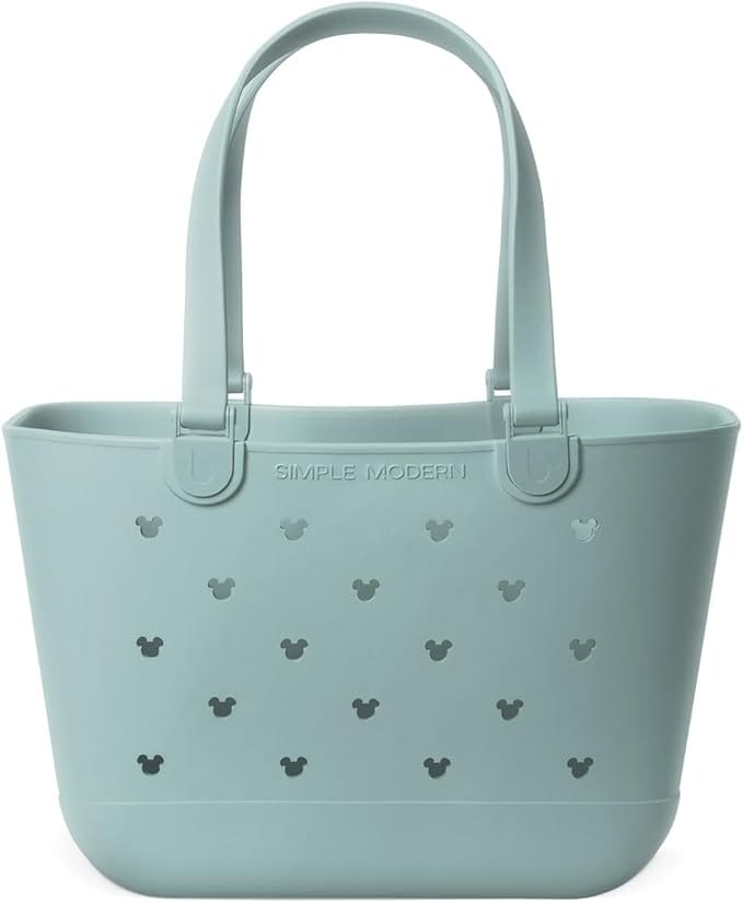 Light blue Disney tote bag with cut-out Mickey Mouse silhouettes and two handles, labeled "Simple Modern.