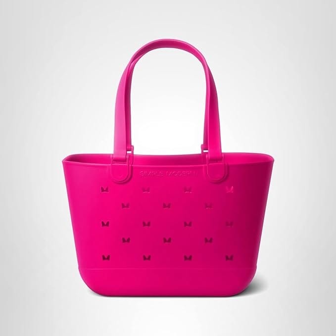 Bright pink Disney tote bag with butterfly cutouts and two handles, labeled "Simple Modern."