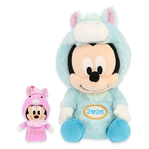 Tokyo Disney Resort 2026 New Year plush Mickey in blue, Minnie in pink animal costumes—exclusive park collection, no castle shown.