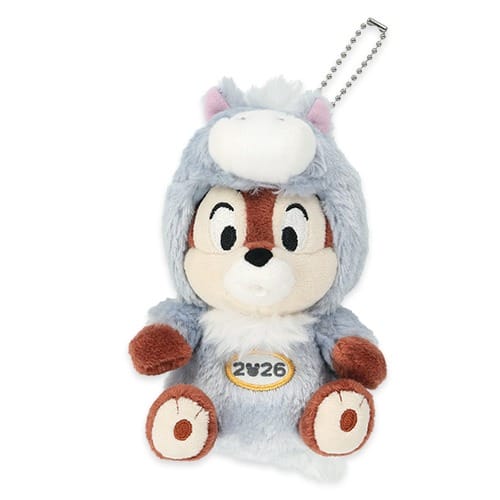 Plush chipmunk toy in gray costume with "2026" badge, Tokyo Disney Resort New Year’s merchandise, chain on head. No castle pictured.