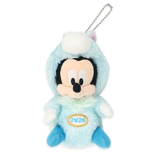 Plush Mickey Mouse in a blue animal suit from Tokyo Disney Resort 2026 New Year’s line, “2/26” on front; no castle featured.