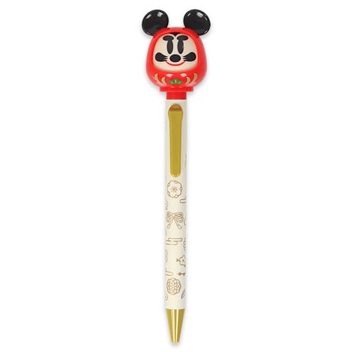 Tokyo Disney Resort pen with a red Daruma Mickey topper and gold 2026 New Year’s accents; no castle like Cinderella’s or Sleeping Beauty’s.