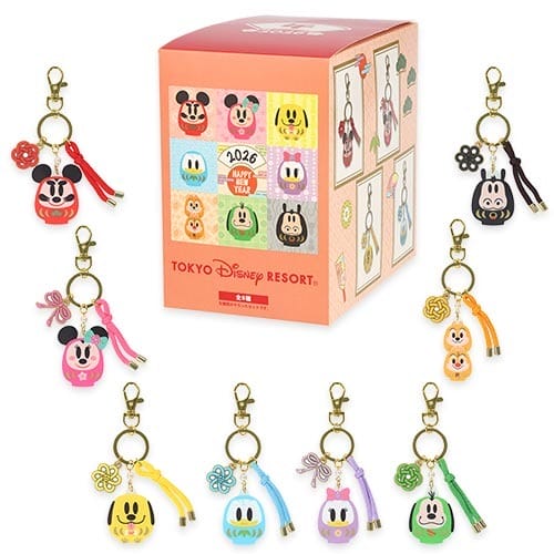 Box and eight vibrant Tokyo Disney Resort keychains in festive 2026 New Year's outfits, unique to Tokyo compared to other Disney parks.
