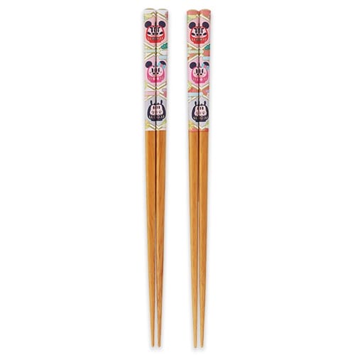 Two pairs of wooden chopsticks with bright Disney-style animal faces, from Tokyo Disney Resort’s 2026 New Year’s merchandise.