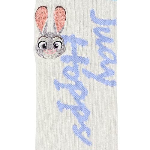 White sock from Tokyo Disneyland featuring Judy Hopps’ face, ears, and blue “Judy Hopps” text—a unique Zootopia 2 souvenir!