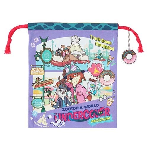 A vibrant Zootopia pouch from Tokyo Disneyland with character art, playful text, and a donut charm—unique to Tokyo’s park merch.