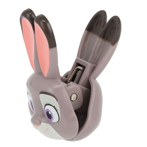 A gray bunny-shaped nail clipper with big pink ears, styled like Zootopia 2 merch found at Disney parks—not a castle souvenir.