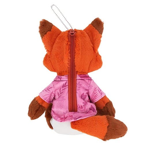 Plush fox toy facing away, wears a pink shirt with a back zipper and chain—ideal for Tokyo Disneyland, home to Cinderella Castle.