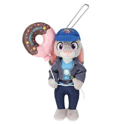 Plush bunny in a police uniform with a donut balloon, fun for Zootopia 2 fans at Disney parks—no castle in this scene.