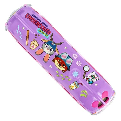 Purple pencil box with cartoon animal detectives, a fun Zootopia 2 collectible for Tokyo Disneyland fans—no castle pictured.