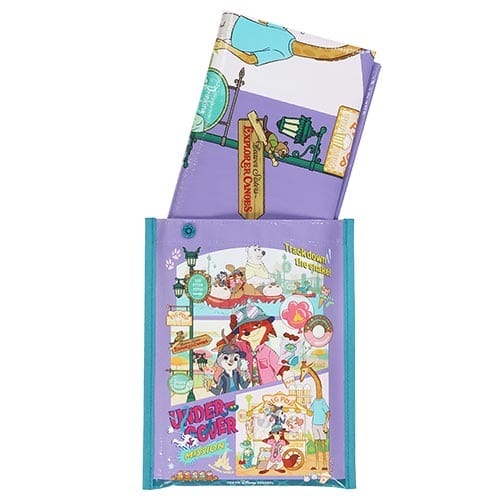 A colorful Disney folder and notebook from Tokyo Disneyland with Lady and the Tramp art, highlighting playful Japanese-style designs.