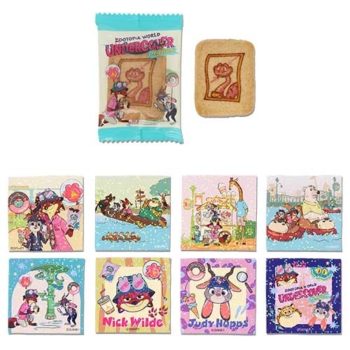A cookie with a camel wrapper, above eight vibrant Zootopia 2 character cards from Tokyo Disneyland—no castle in view.