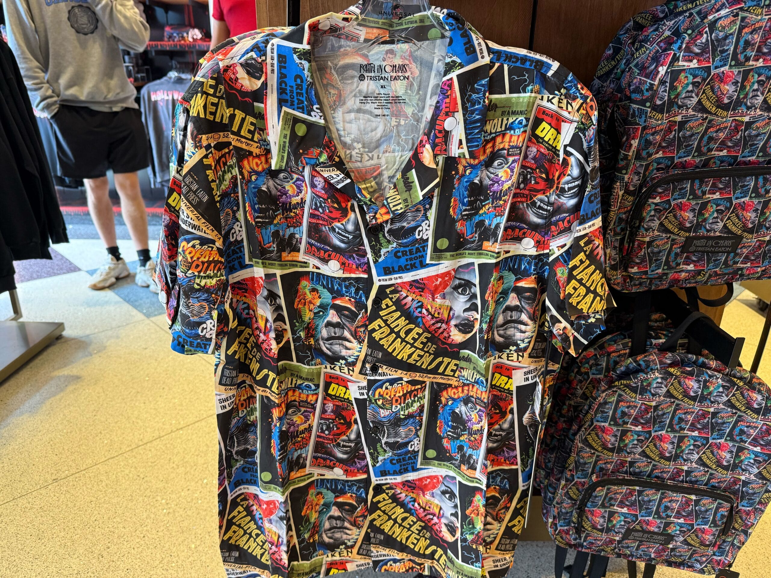 Shirt with vibrant vintage Marvel comics print, paired with a matching backpack from Universal Studios, not Disney Parks.