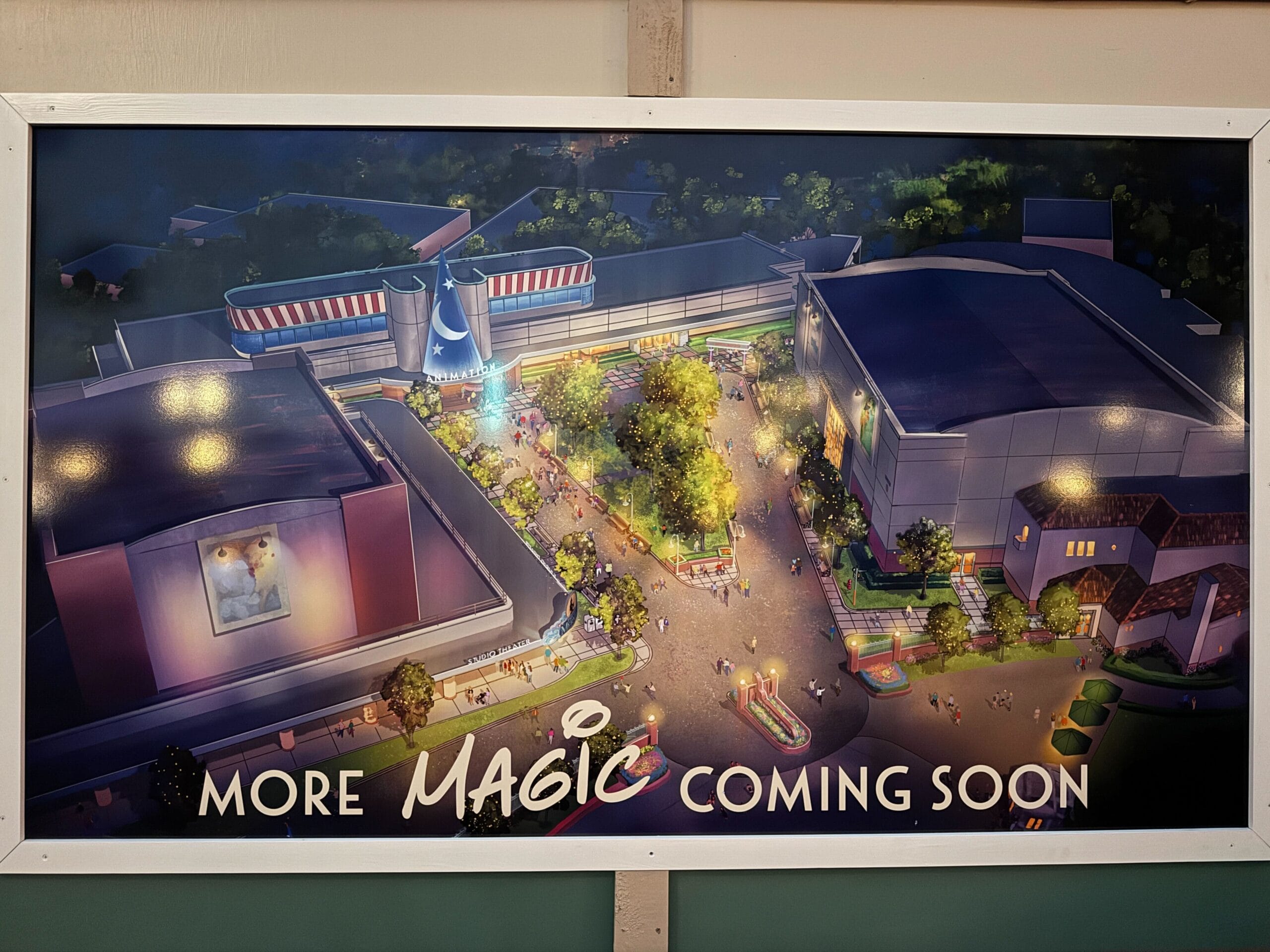 Concept art poster hints at new Disney park area behind construction walls, with "MORE MAGIC COMING SOON" and castle silhouette.