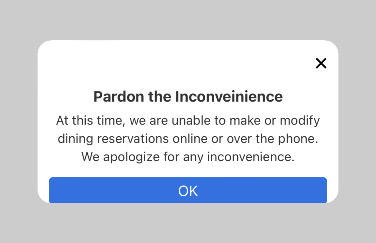 Popup: "Pardon the Inconvenience"—Disney World dining reservations unavailable due to reservation system down. "OK" button below.