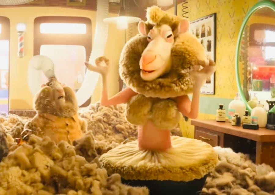 Two animated sheep in a barbershop, shorn wool everywhere—one poses dramatically like Finnick from Zootopia 2.