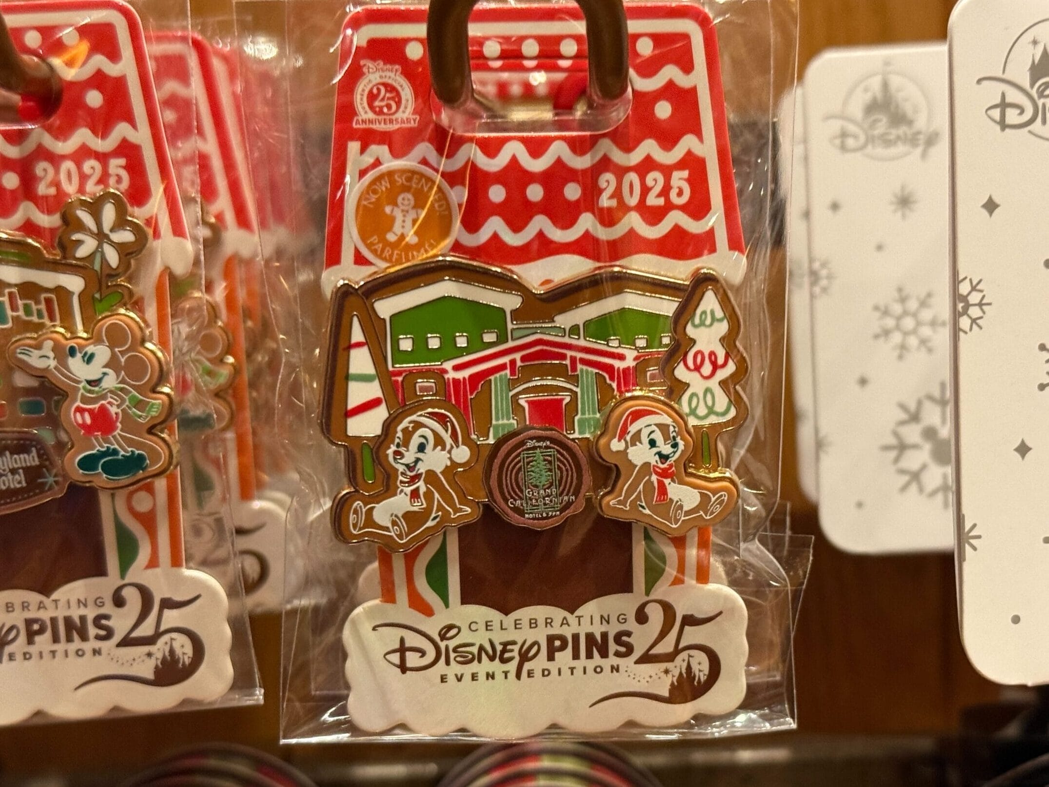 Disney holiday pin featuring Mickey, gingerbread house, and candy canes—no castle like Disneyland or Cinderella Castle shown.