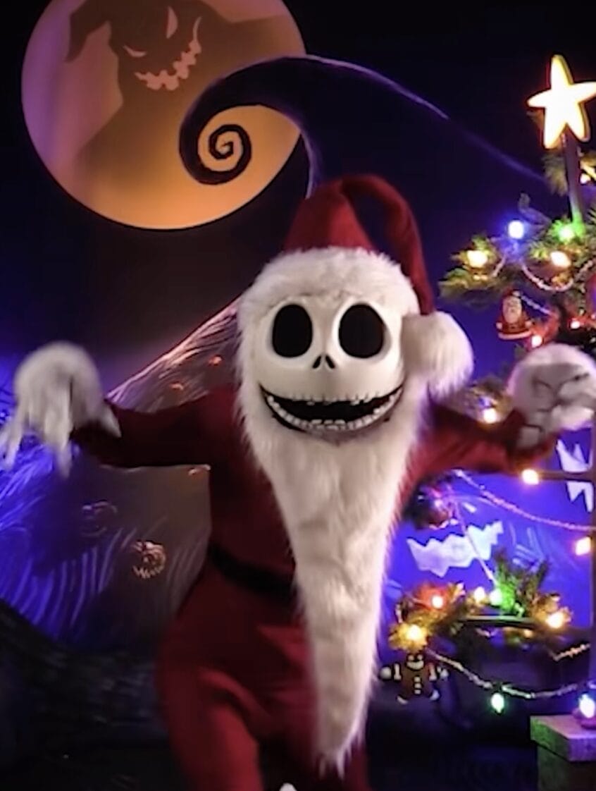 Jack Skellington’s new look dazzles as he poses by a moonlit tree at Disney—ideal for a festive meet & greet in the parks.
