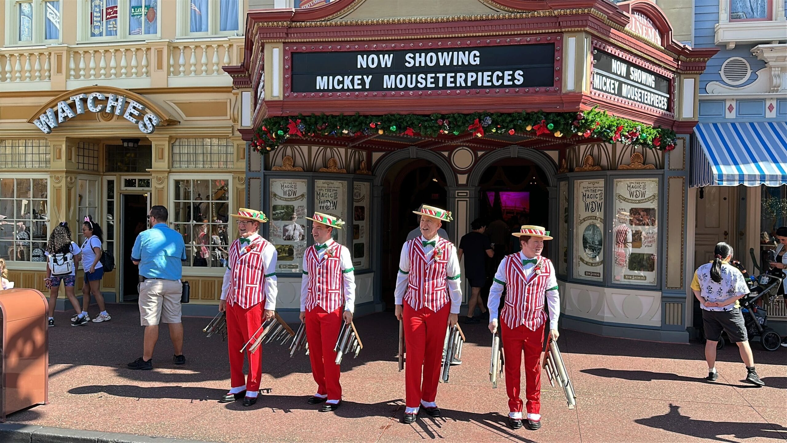 Dapper Dans in their holiday outfits at Magic Kingdom