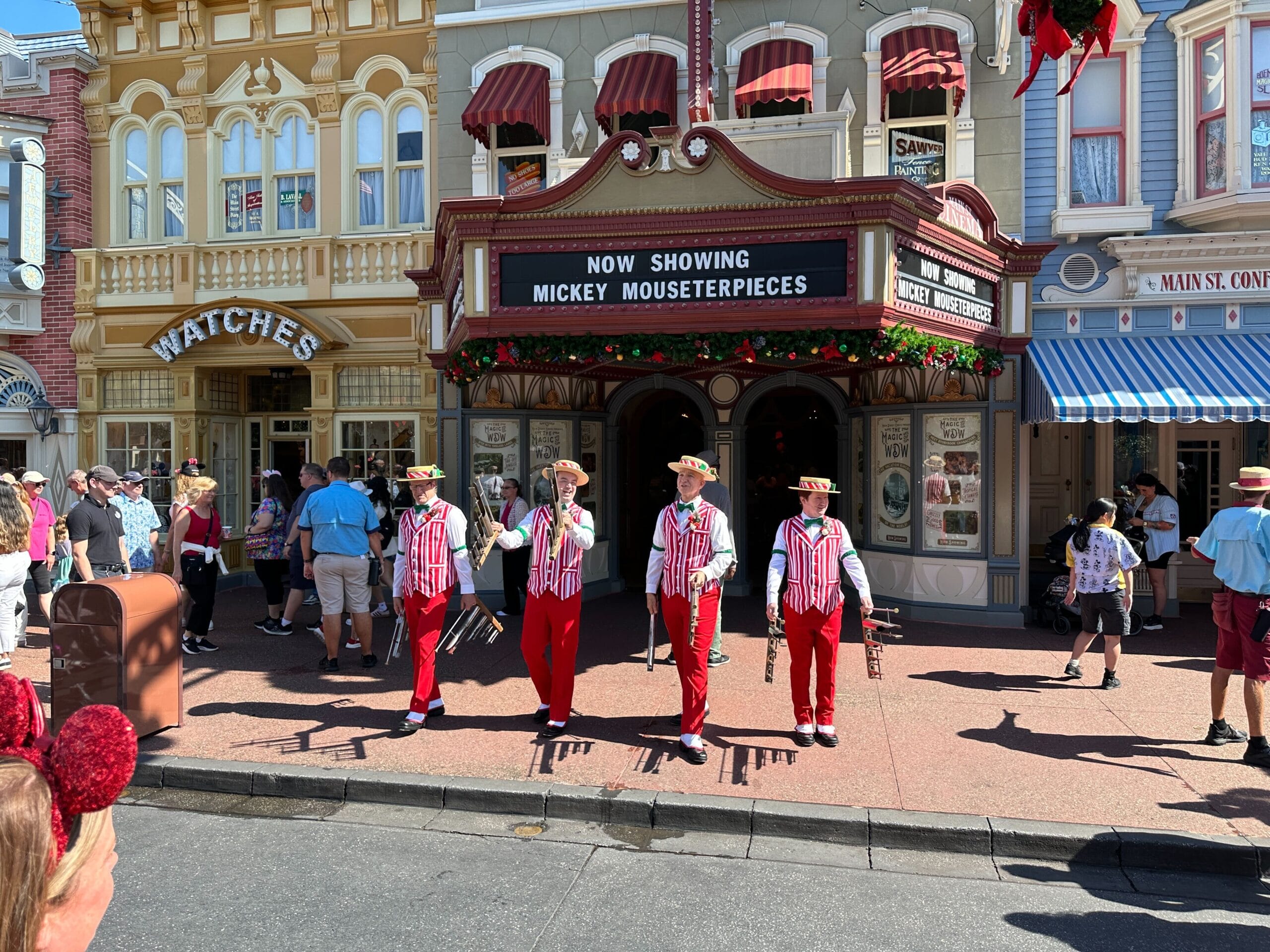 Dapper Dans in their holiday outfits at Magic Kingdom