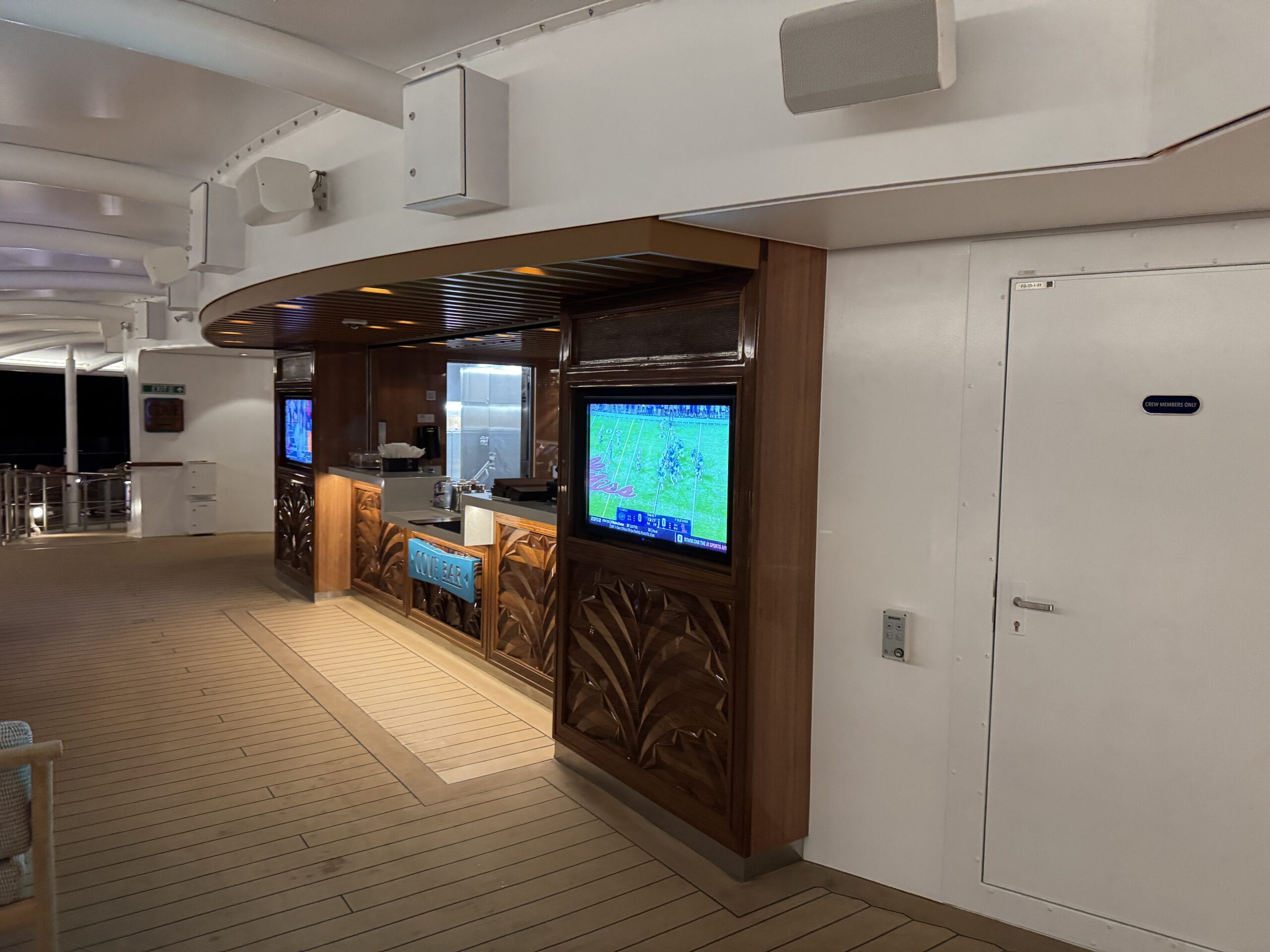 Adults can escape the hustle and bustle of the Disney Destiny by stopping in at the Cove Café and Cove Bar.