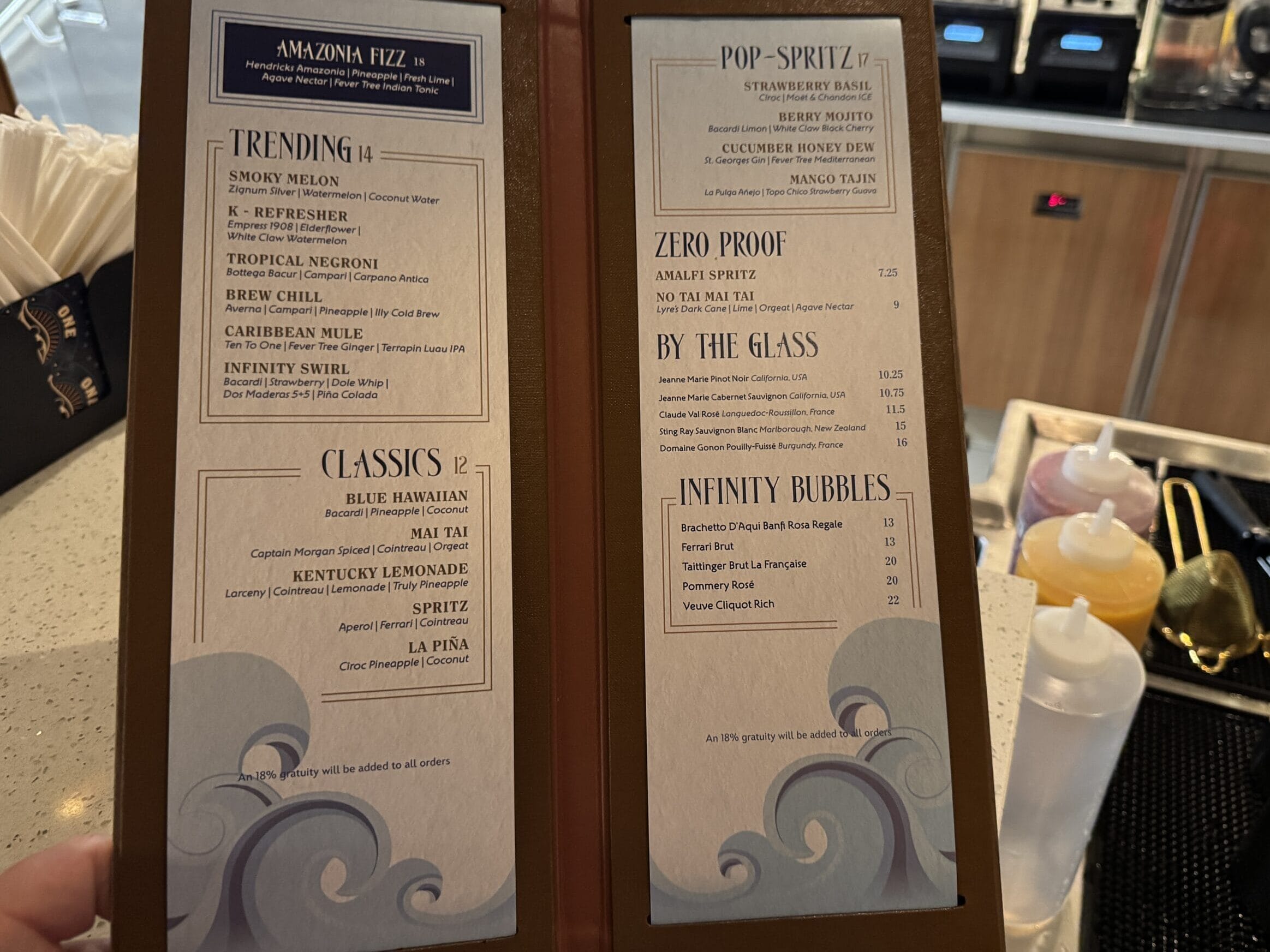 Adults can escape the hustle and bustle of the Disney Destiny by stopping in at the Cove Café and Cove Bar.