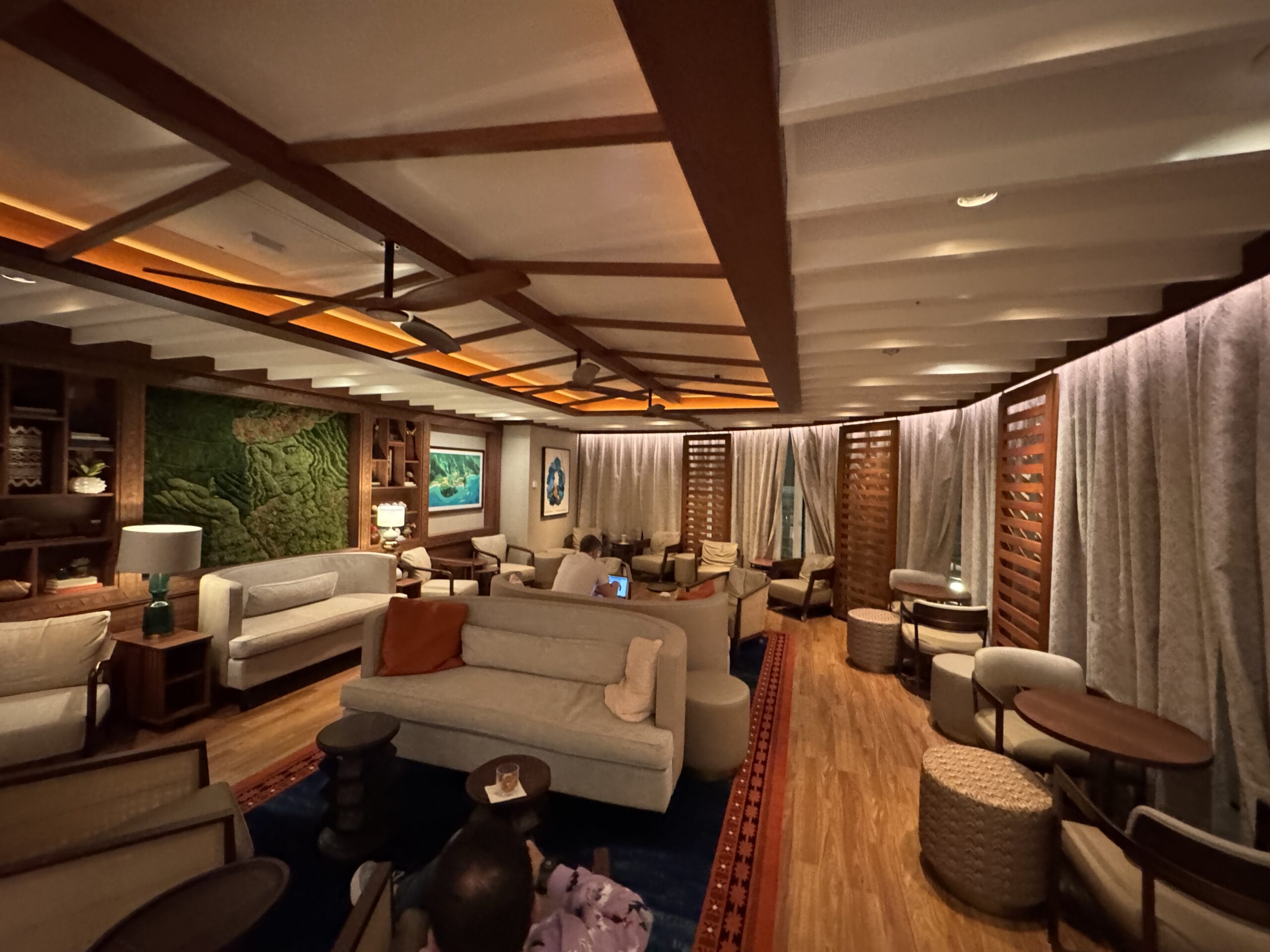 Adults can escape the hustle and bustle of the Disney Destiny by stopping in at the Cove Café and Cove Bar.