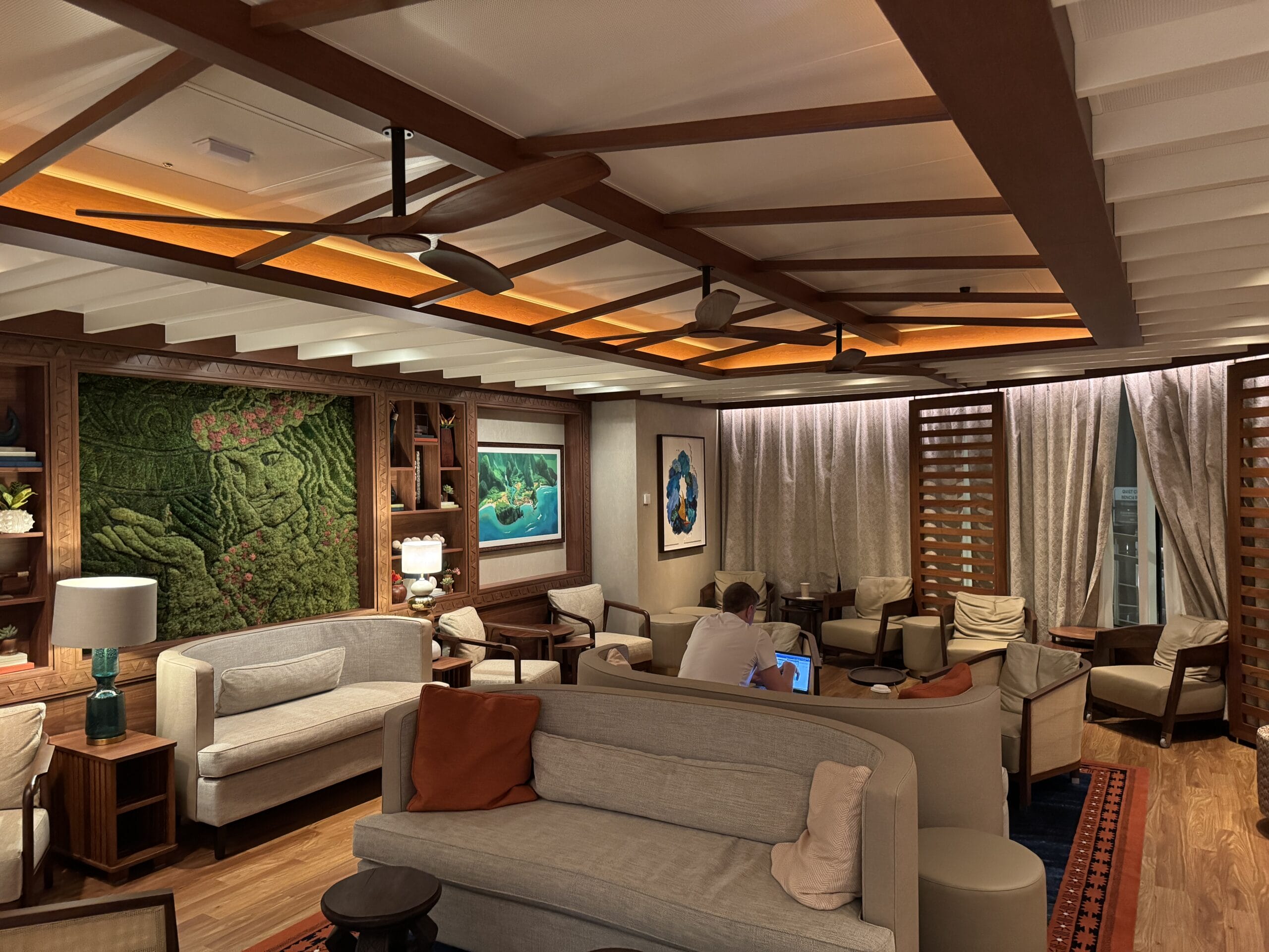 Adults can escape the hustle and bustle of the Disney Destiny by stopping in at the Cove Café and Cove Bar.