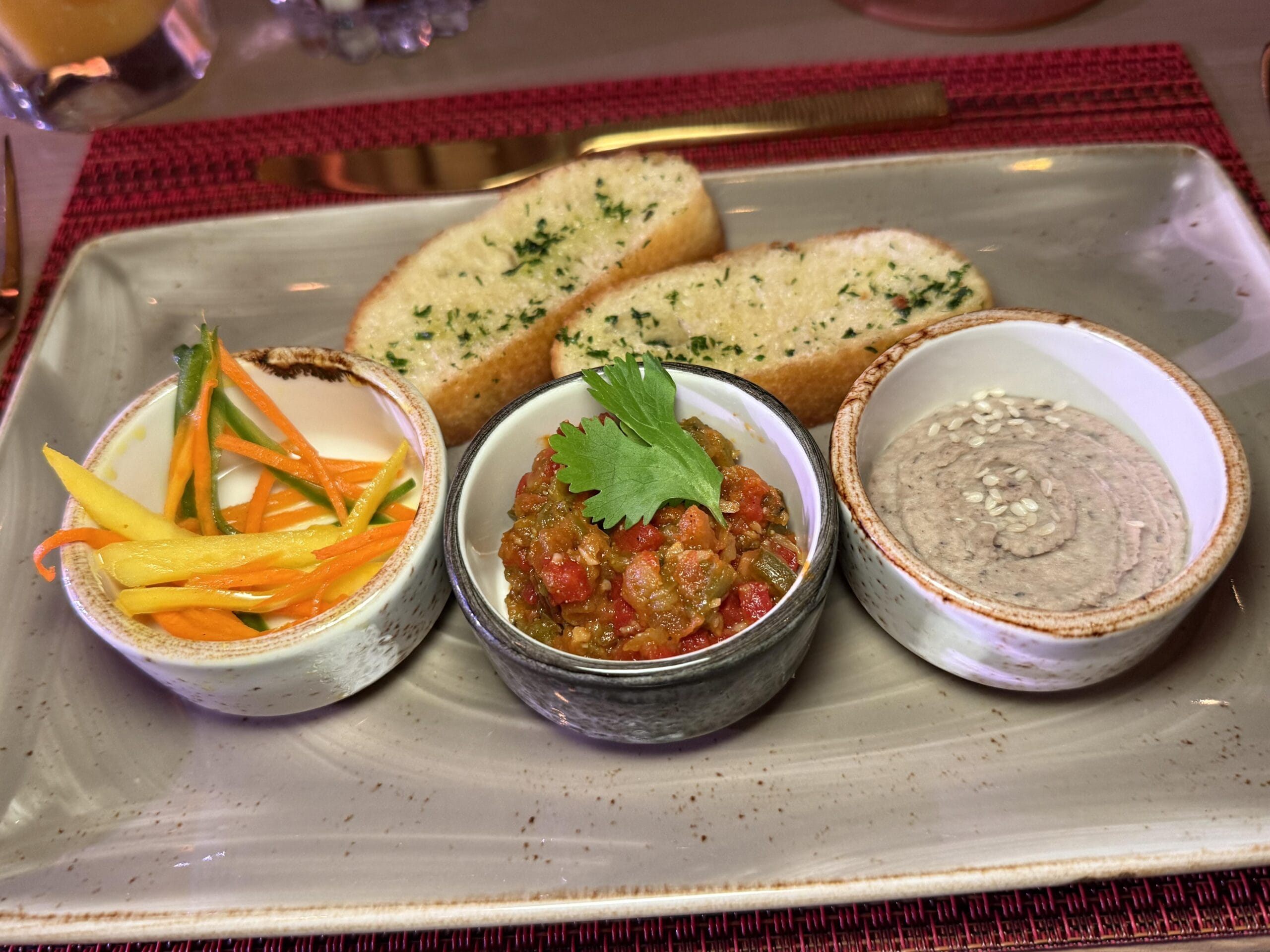 Matbucha, Carrot-Green Mango Atchar, and Toasted Tiger Bread