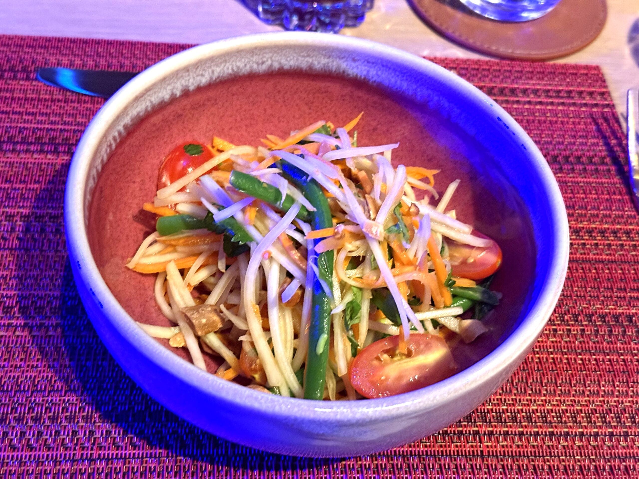 Green Paypa salad with Long Beans, Red Chili, Roasted Peanuts, Grape Tomatoes, and Palm Sugar-Lime Dressing