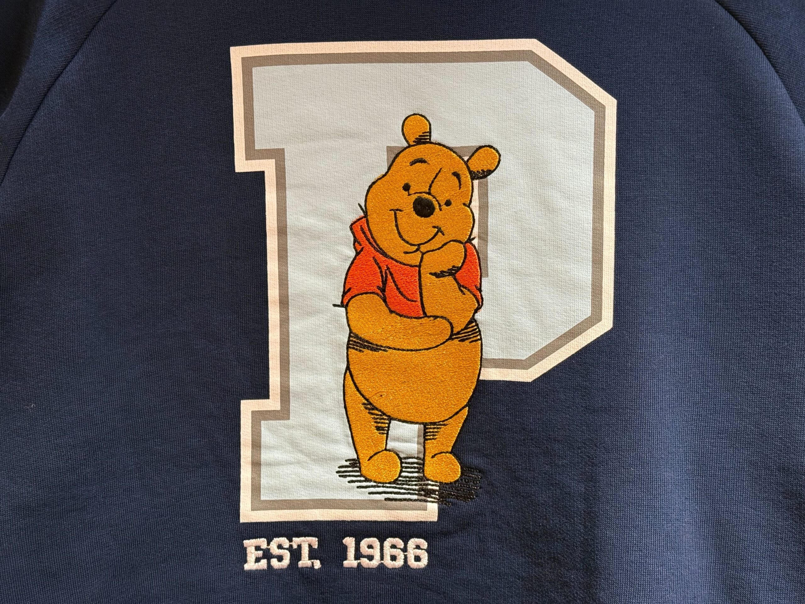 Disneyland has new letterman-style sweatshirts, featuring our friends from the Hundred Acre Wood.