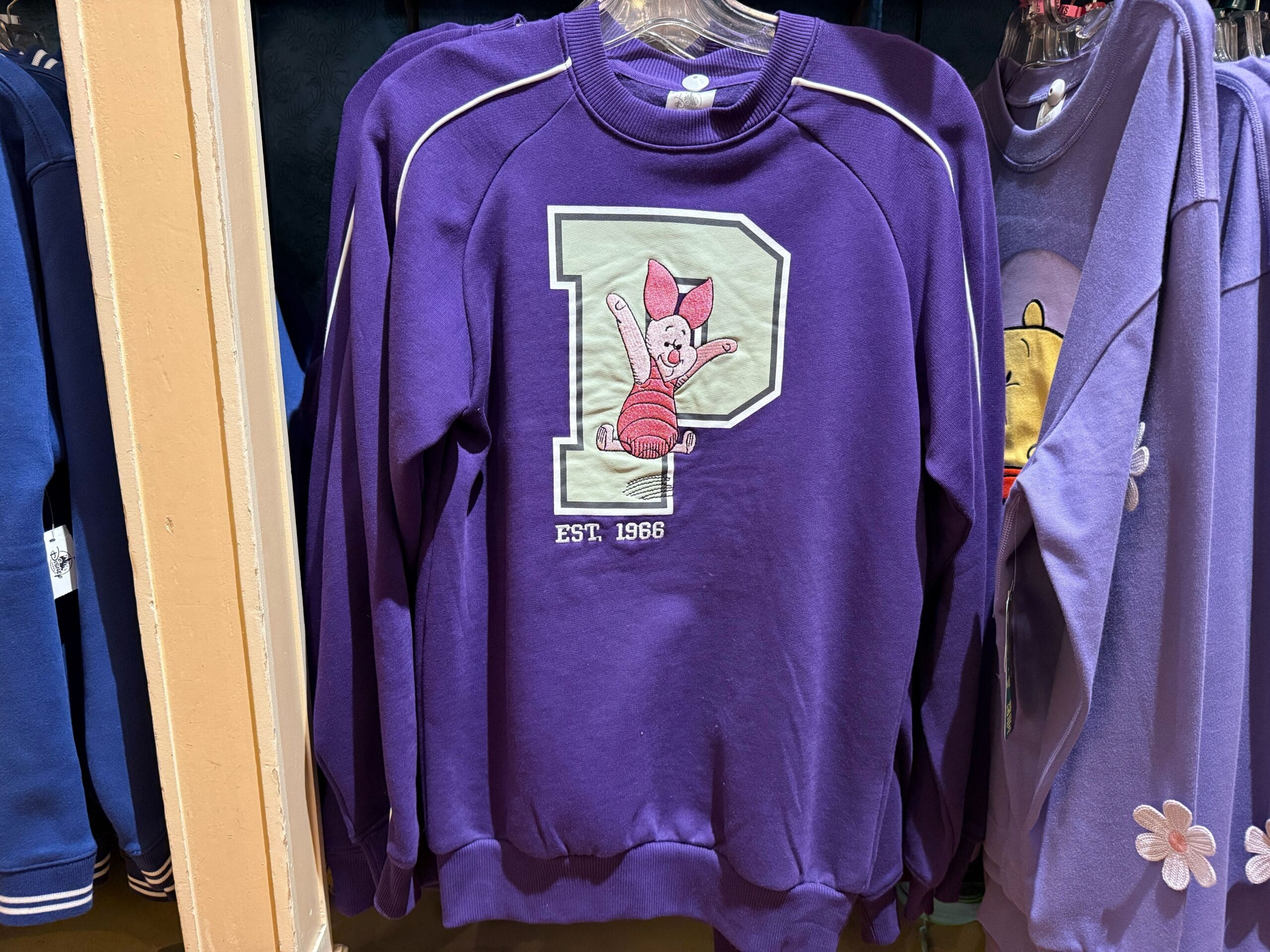 Disneyland has new letterman-style sweatshirts, featuring our friends from the Hundred Acre Wood.