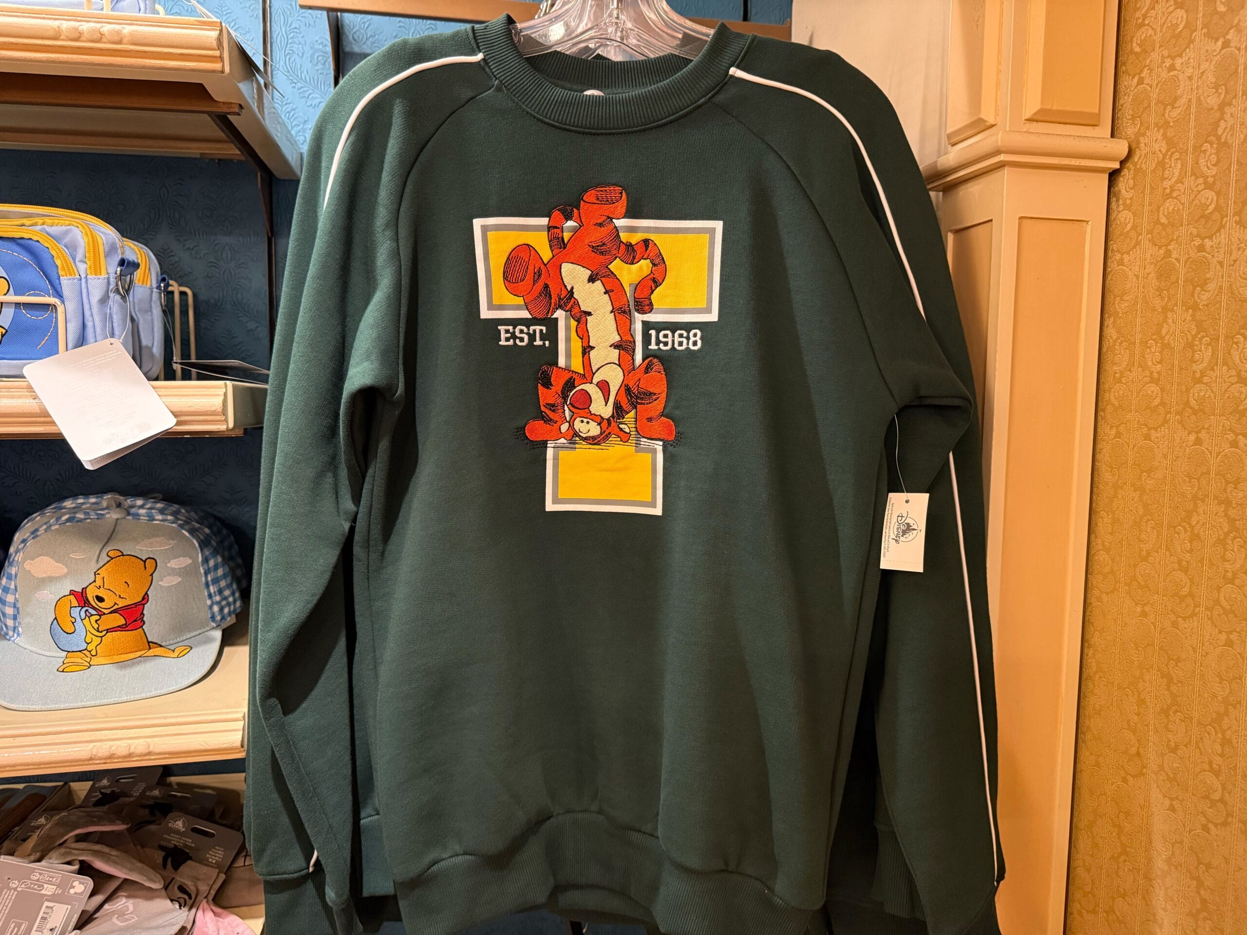 Disneyland has new letterman-style sweatshirts, featuring our friends from the Hundred Acre Wood.