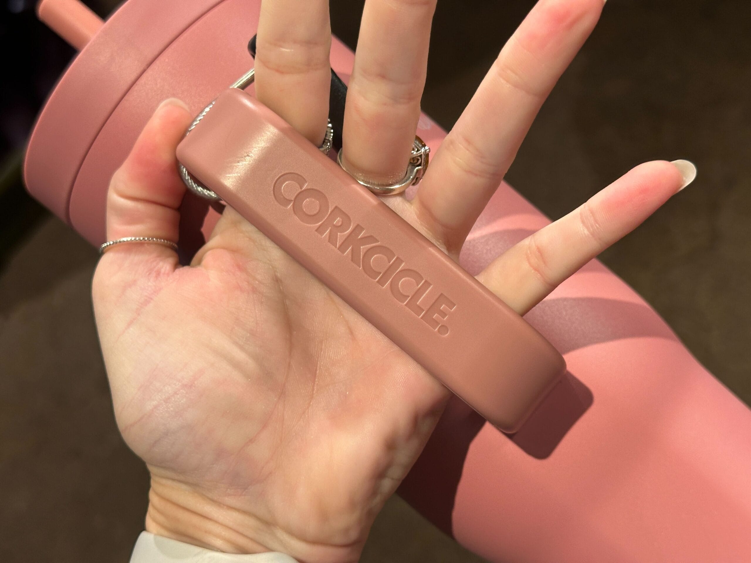 the handle of the pink tumbler