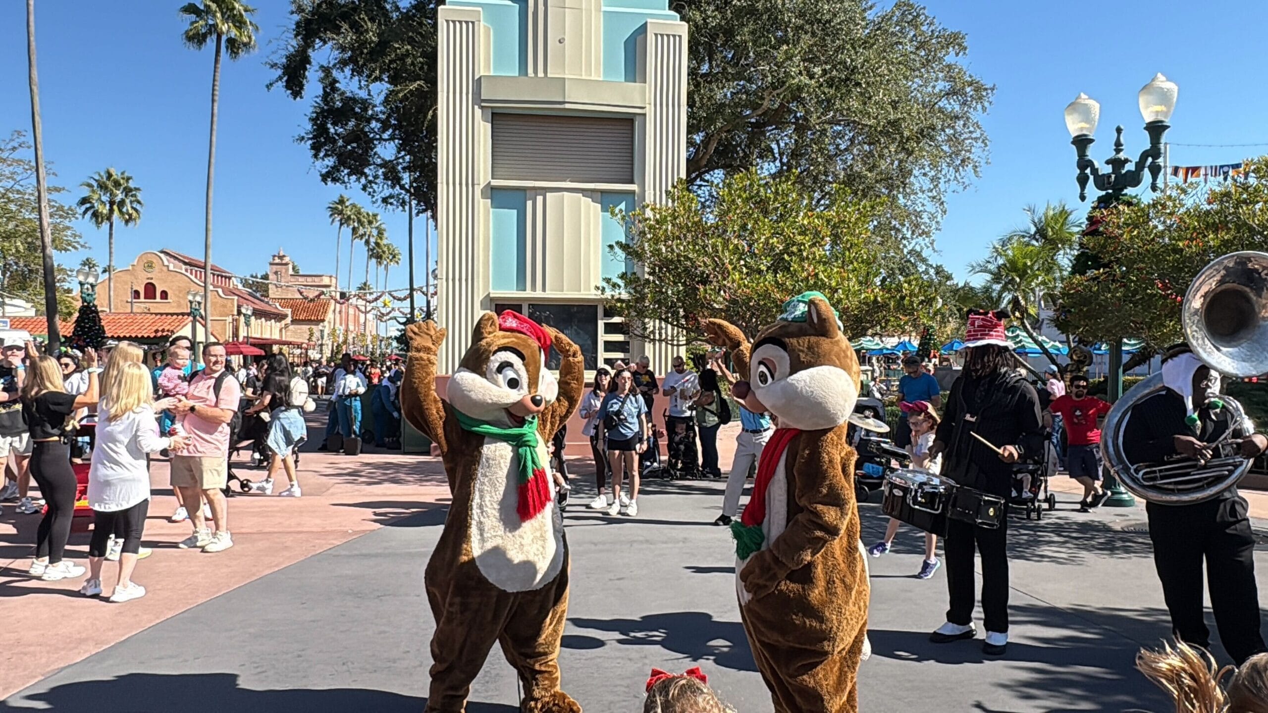 Seasonal entertainment at Disney's Hollywood Studios this winter includes Hollygroove Swingin', a brass band accompanied by Chip 'n' Dale.