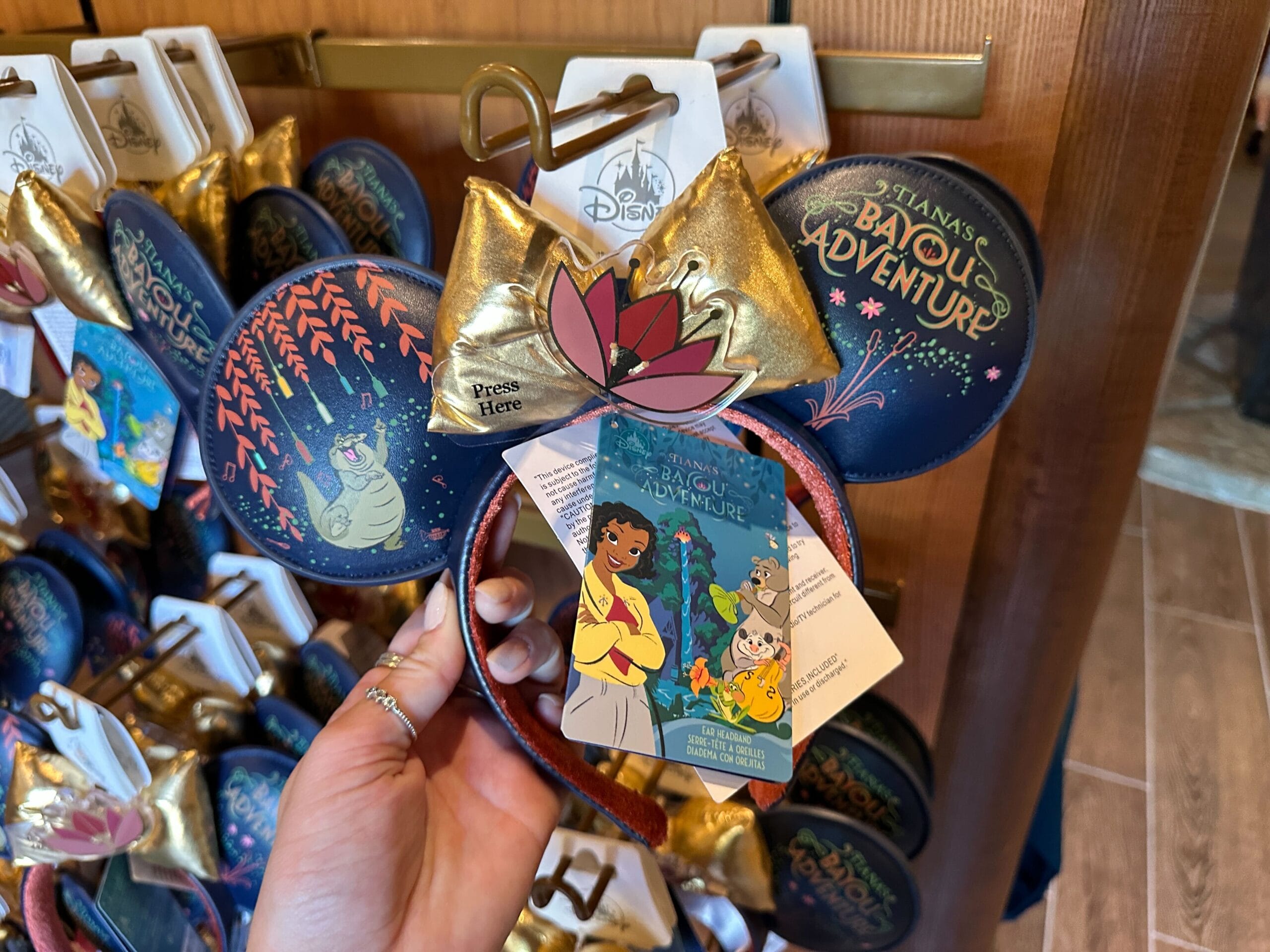 A Tiana's Bayou Adventure ear headband is discounted from $20 from $39.99